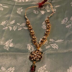 Elegant Gold and Red Necklace